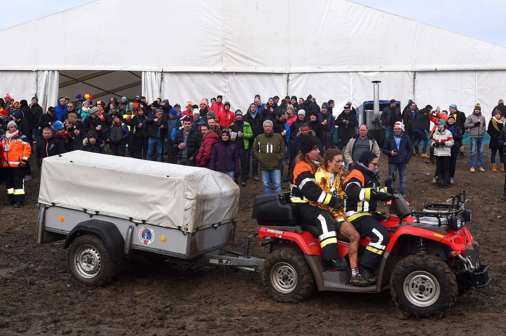 Alice Maria Arzuffi (Italy) is carried off the course after her race ending crash