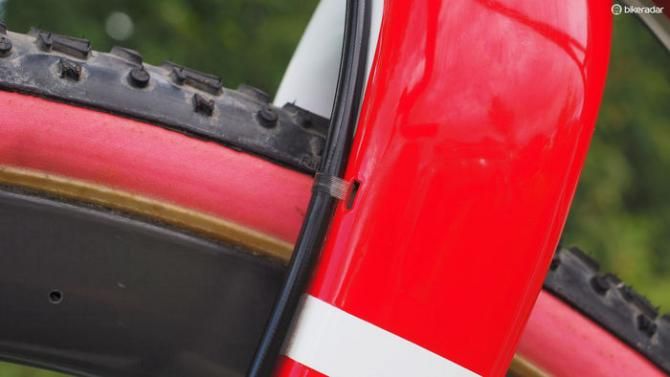 Brake hoses are secured with a mix of fishing line and Krazy Glue