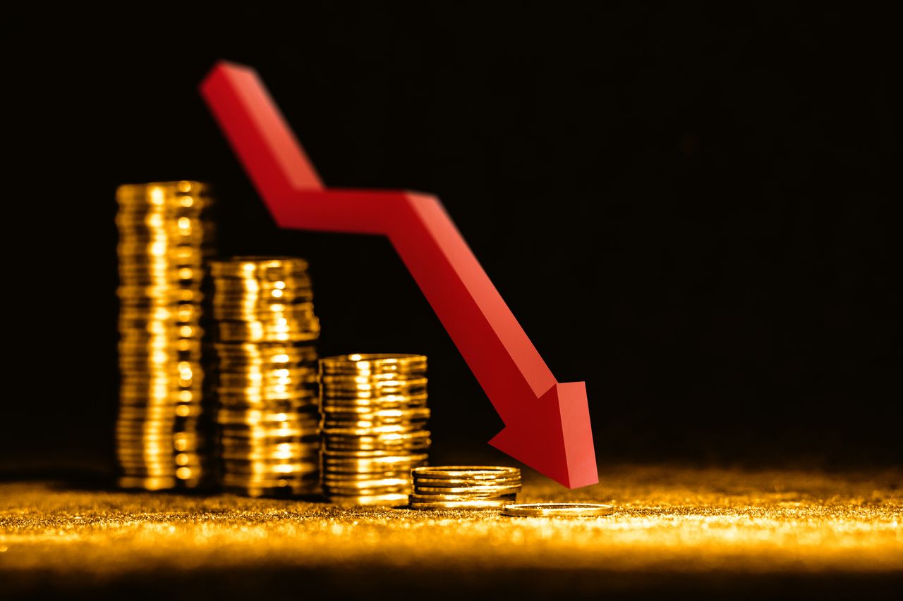 Golden coins isolated on black background