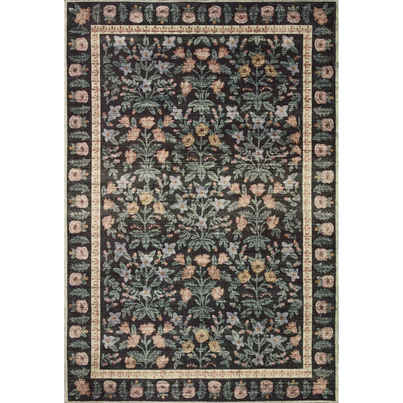 black rug with floral motif