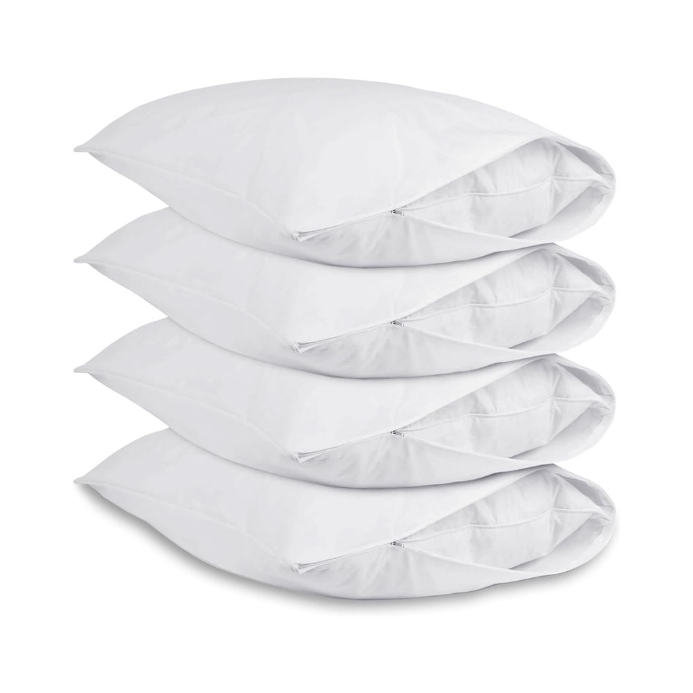 Four white pillow protectors