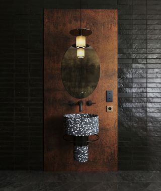 A bathroom with a marble sunk, and glossy wall tiles