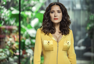 Salma Hayek wearing a yellow hoodie in Black Mirror season 6