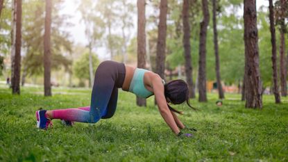 Woman doing bear crawl