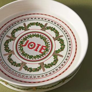 Festive Bistro Pie Dish against a green background.