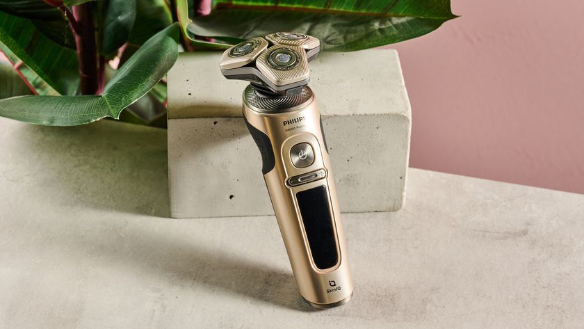 Philips Shaver S9000 Prestige resting on block