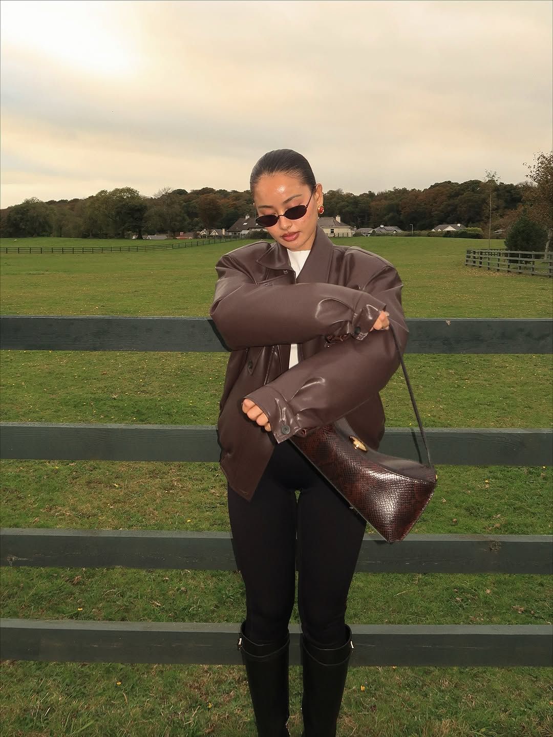 woman wearing leggings with boots outfit 2026