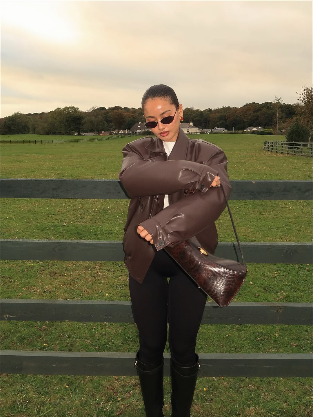 woman wearing leggings with boots outfit 2026