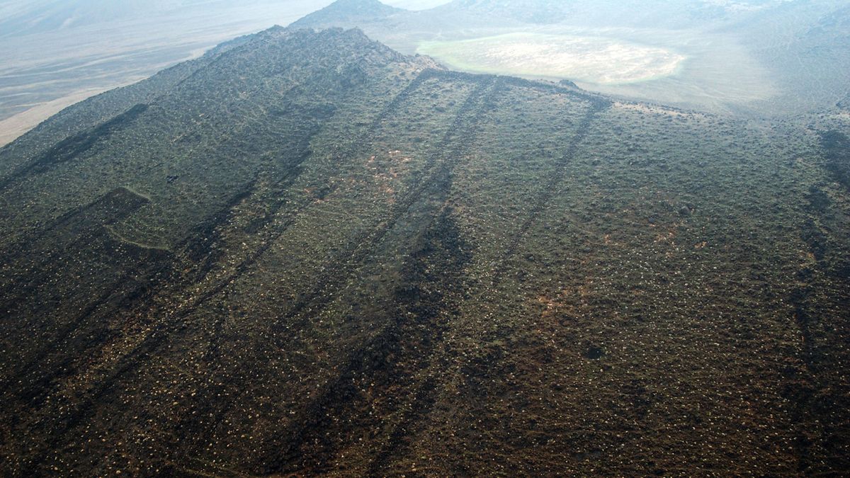 Mustatils have been found in a wide variety of environments in Saudi Arabia including six examples seen here on the slope of a volcano.