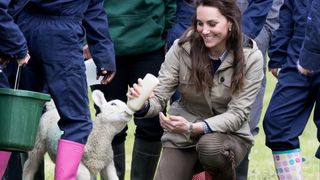 Kate Middleton feeding a lamb