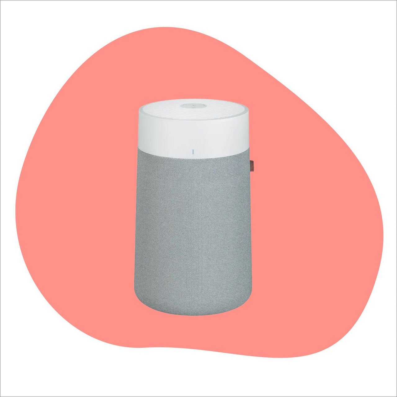 Blueair air purifier on a white and pink background