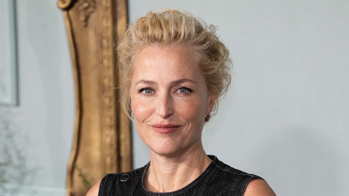 Gillian Anderson stuns with messy bun and fresh face as she shows the 'truth' of what she looks like away from red carpets in celebration of 'pretty f***ing cool' achievement
