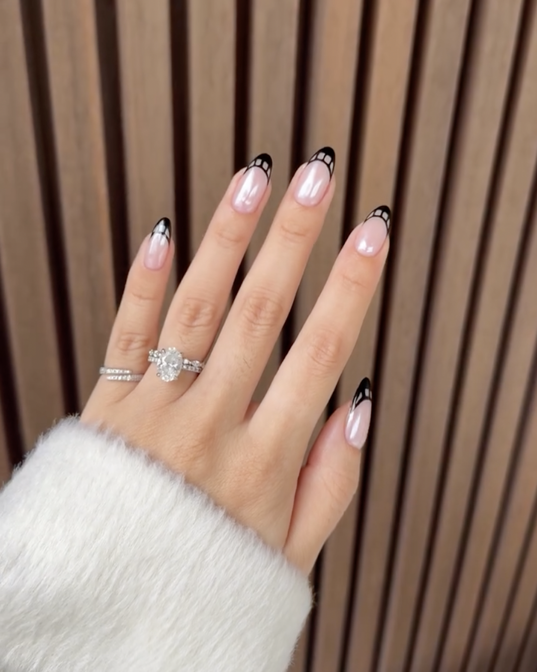 Sabrina Carpenter with film print French tips