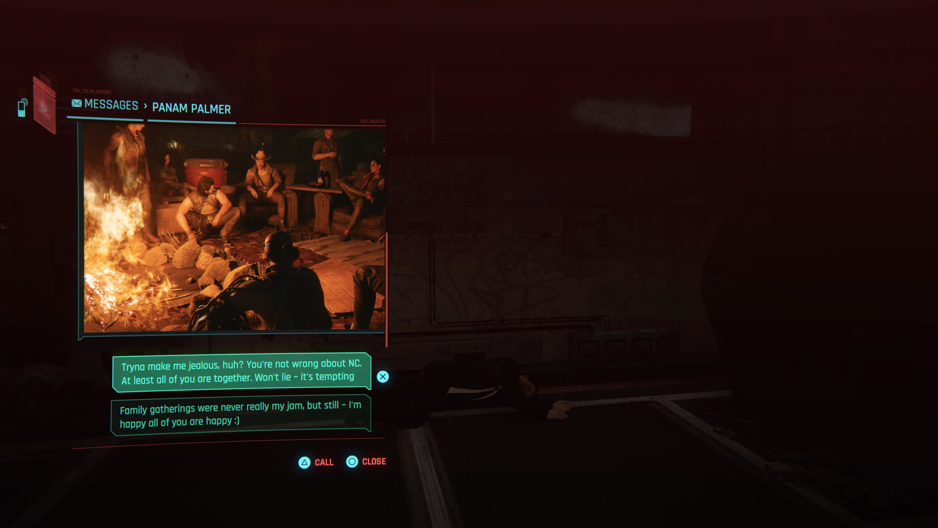 A text from Panam in Cyberpunk 2077 shows an image of her sitting around a fire with the Nomad Aldecaldos