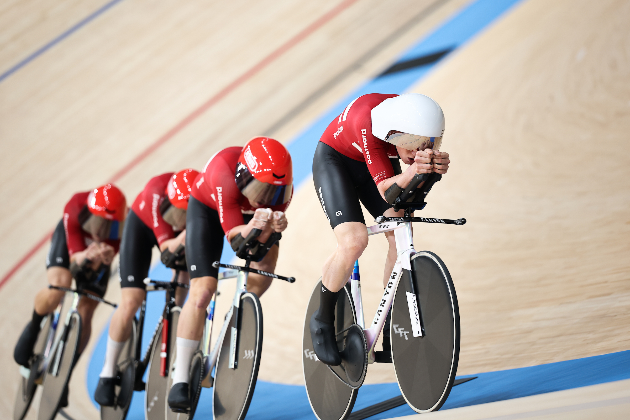 Tobias Hansen, Carl-Frederik B&amp;eacute;vort, Frederik Madsen, Rasmus Pedersen (Denmark) racing on the track in the men's team pursuit qualifying round