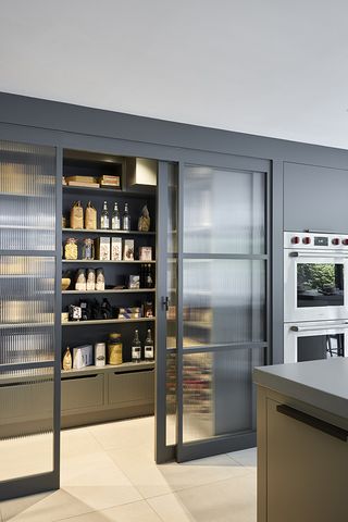 pantry with sliding doors
