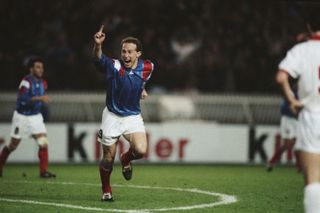 Jean-Pierre Papin celebrates a goal for France against Belgium in 1992.