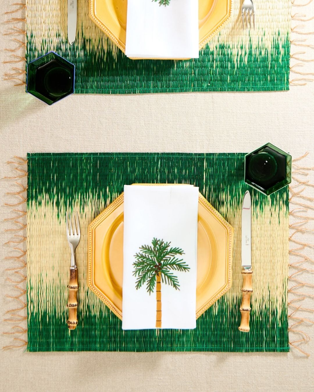 A series of sculptural rattan decorative items, including place mats, cake stands, laundry baskets, lights, napkin rings, and storage units.