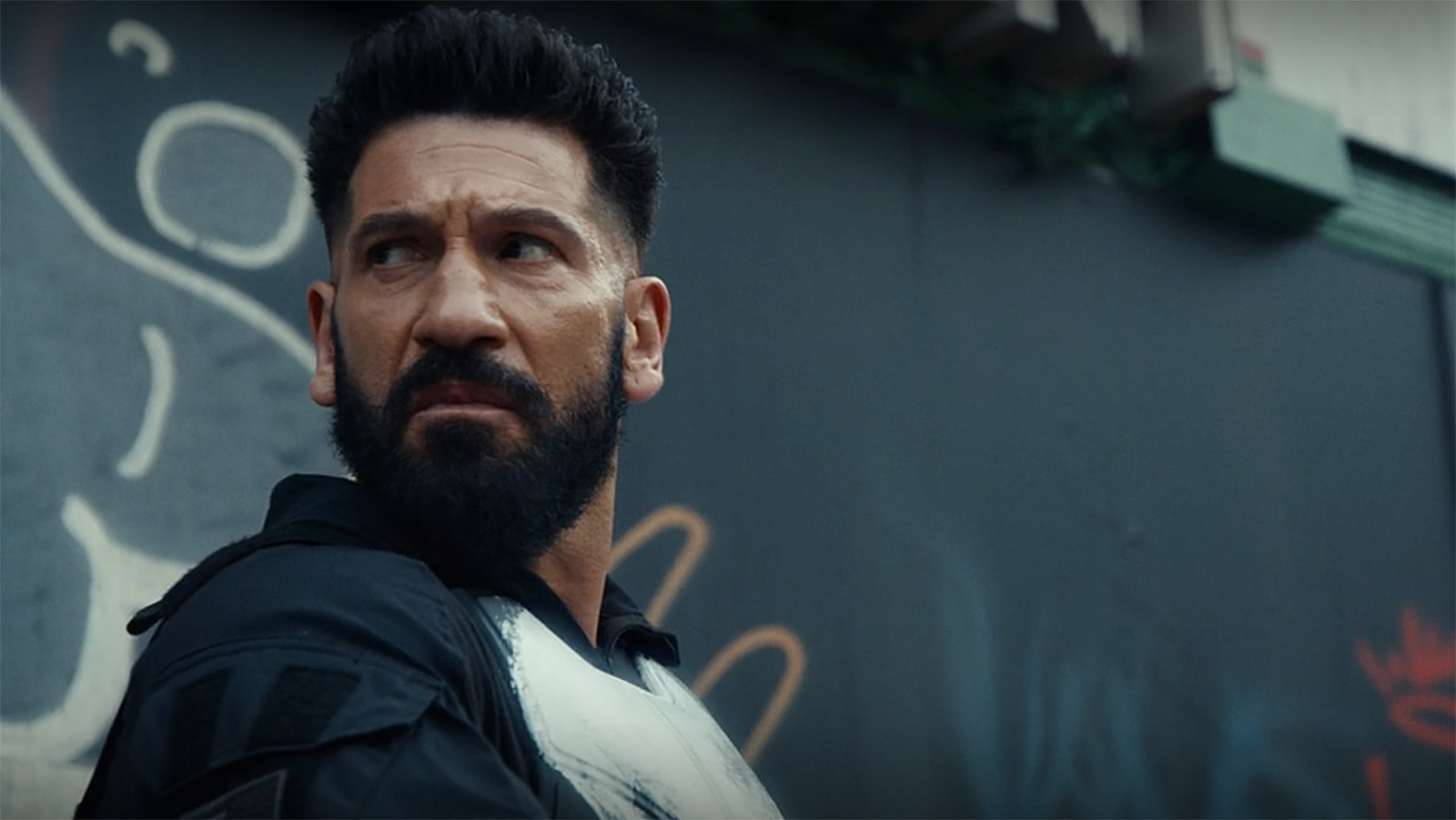 Frank Castle looking back at someone off-camera in The Punisher: One Last Kill