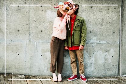 Valetines day illustreated by couple hiding behind flowers