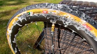 An extremely soapy bubbling tyre after mounting