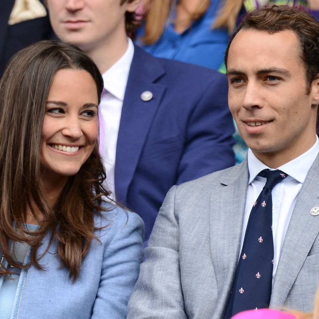 Pippa Middleton smiles at brother James Middleton at the Wimbledon tennis championships on June 24, 2013