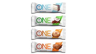 A variety pack of One protein bars in white wrappers.