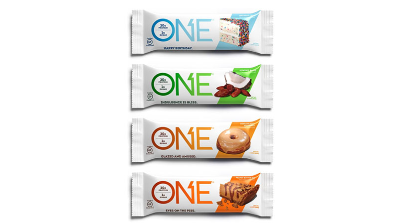 A variety pack of One protein bars in white wrappers.