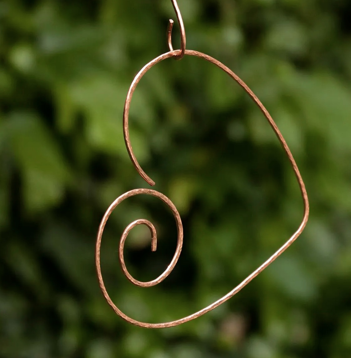 copper heart hummingbird perch from uncommon goods
