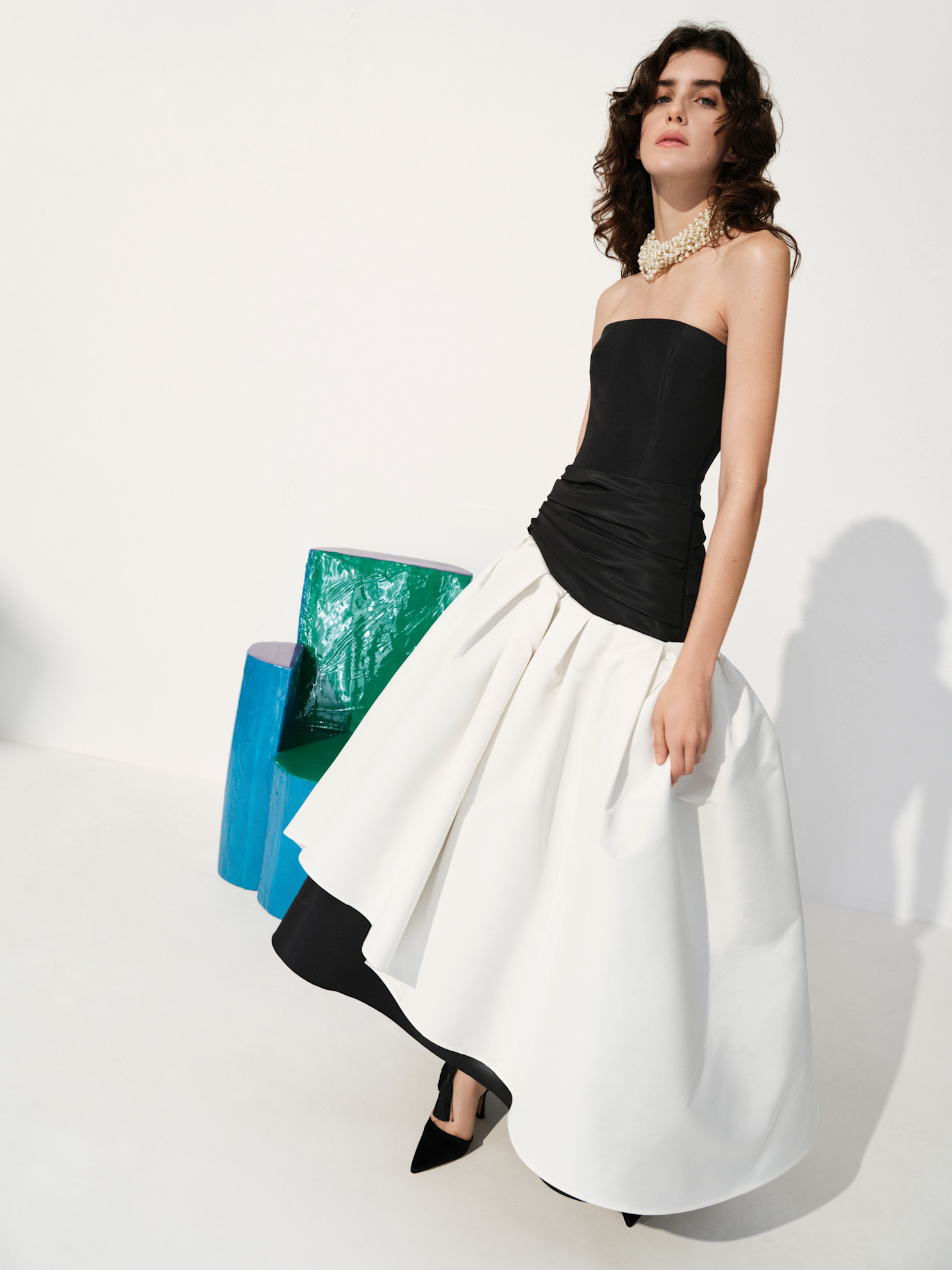 A model wore Dakota Fanning's black-and-white gown for the Carolina Herrera Resort 2027 collection