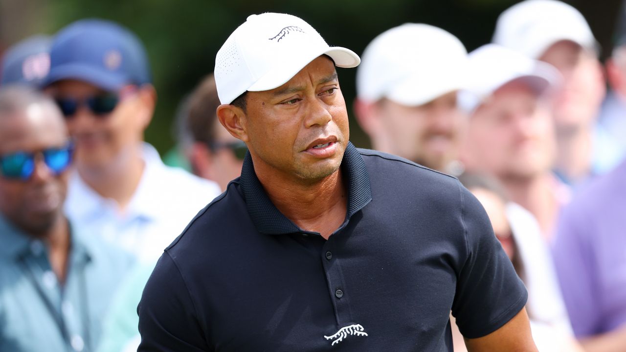 Tiger Woods of the United States looks on from the putting green during a practice round prior to the 2024 Masters Tournament at Augusta National Golf Club on April 10, 2024