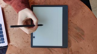 A Kindle Scribe on a table