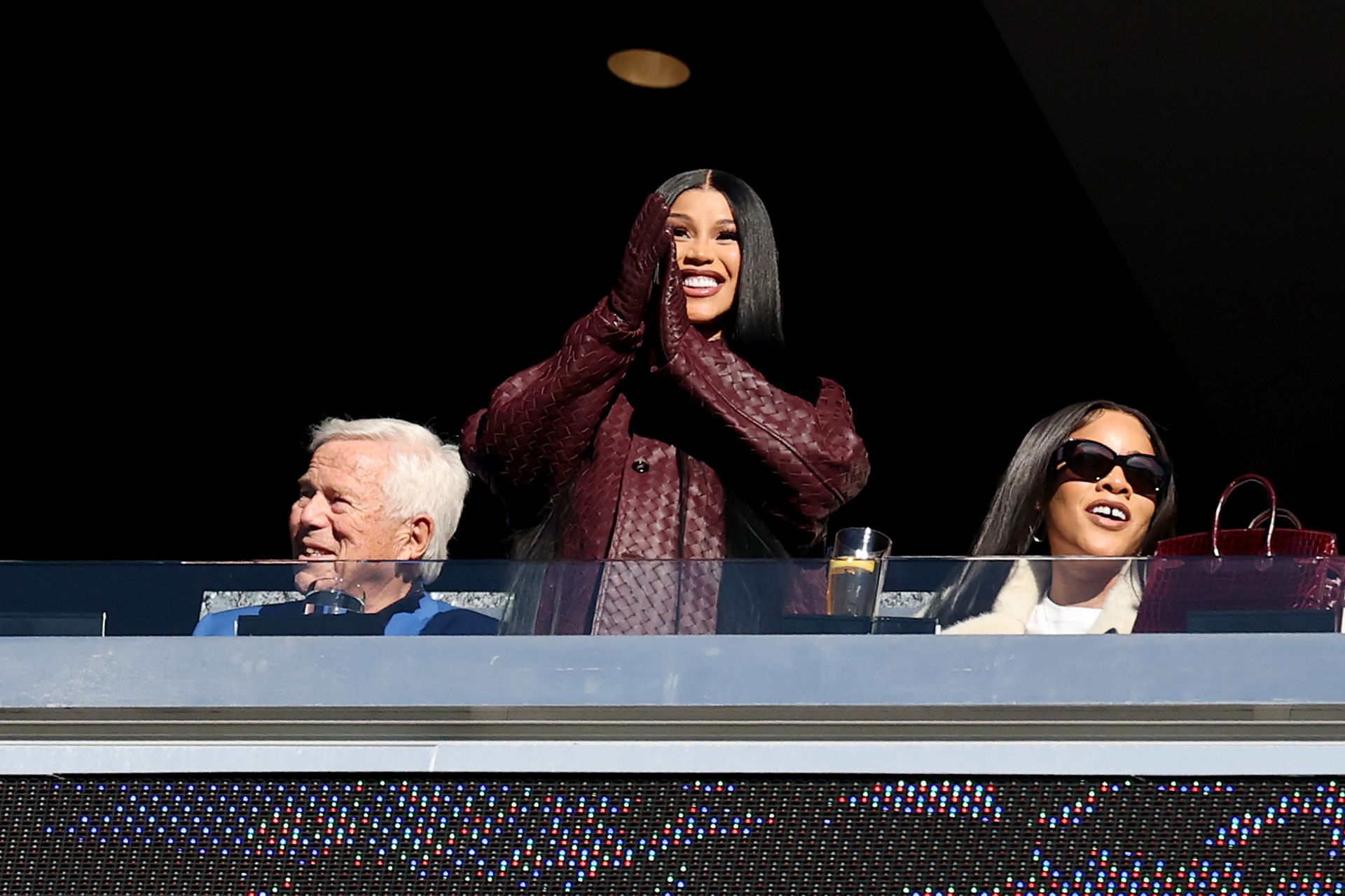 Cardi B Makes Her NFL WAG Debut With a PatriotsInspired Burgundy
