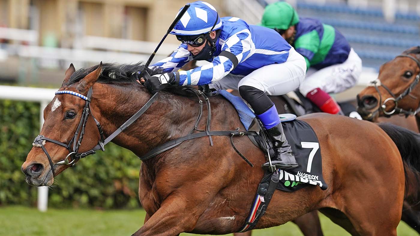 Haqeeqy ridden by Benoit de la Sayette (blue/white) wins The Unibet Lincoln at Doncaster Racecourse.