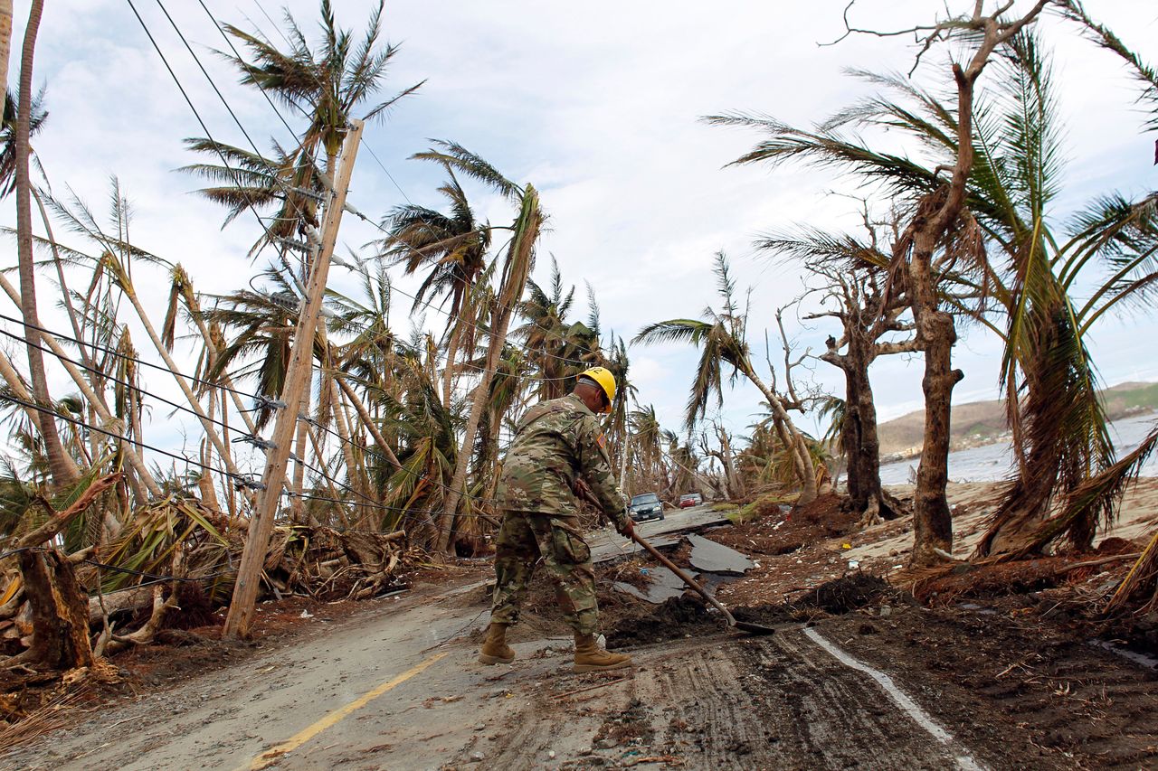 A National Guard member helps with clean up in Puerto Rico