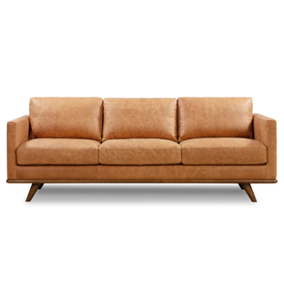 Brown leather sofa with tapered legs