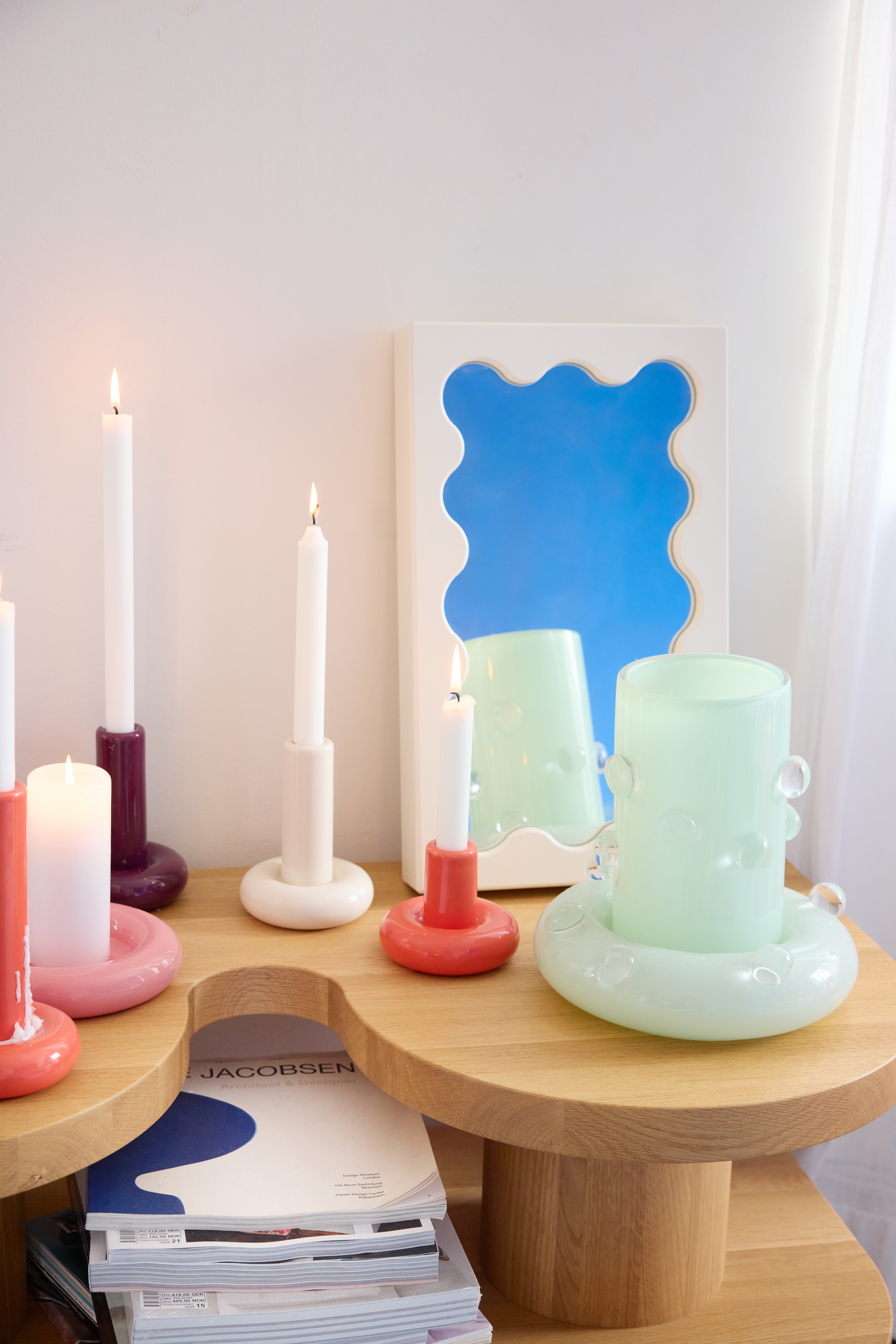 A series of whimsically shaped, pastel-shaded objects with a chunky feel sits in a Scandinavian studio flat with an irreverent atmosphere.