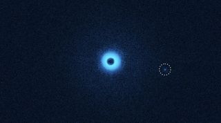 Another infrared image of the binary star and the newly discovered companion, but now viewed with special polarization filters that make dust disks and exoplanets visible. The companion seems to have his own dust disk. 