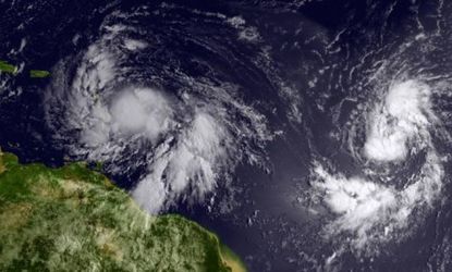 In this handout satellite image provided by National Oceanic and Atmospheric Administration, Isaac reached tropical storm status and is approaching the Lesser Antilles islands as it moves wes