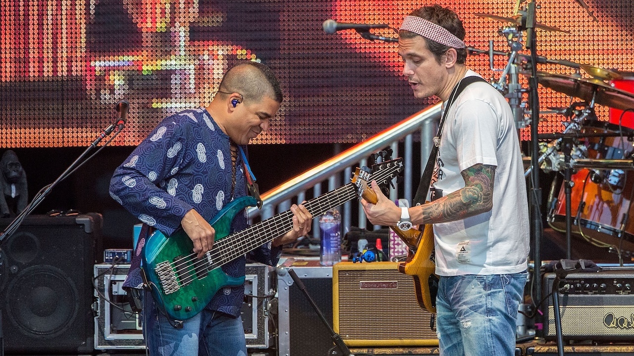 Musicians Oteil Burbridge (L) and John Mayer of Dead & Company perform on stage at Sleep Train Amphitheatre on July 27, 2016 in Chula Vista, California.