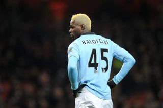 Mario Balotelli scored the winner for Manchester City against Tottenham after escaping a red card