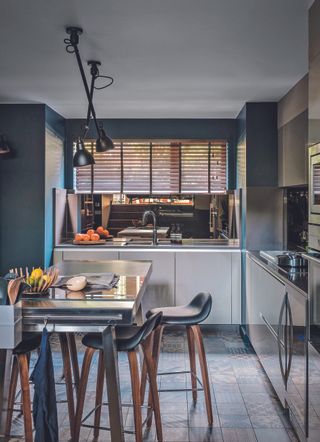 A kitchen with one ceiling light