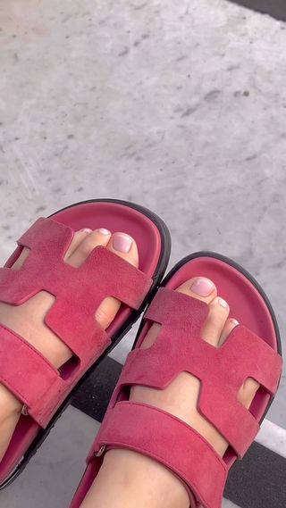Hermes sandals with sheer pink nail colour