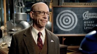 J.K. Simmons smirking in a Farmer's Insurance ad