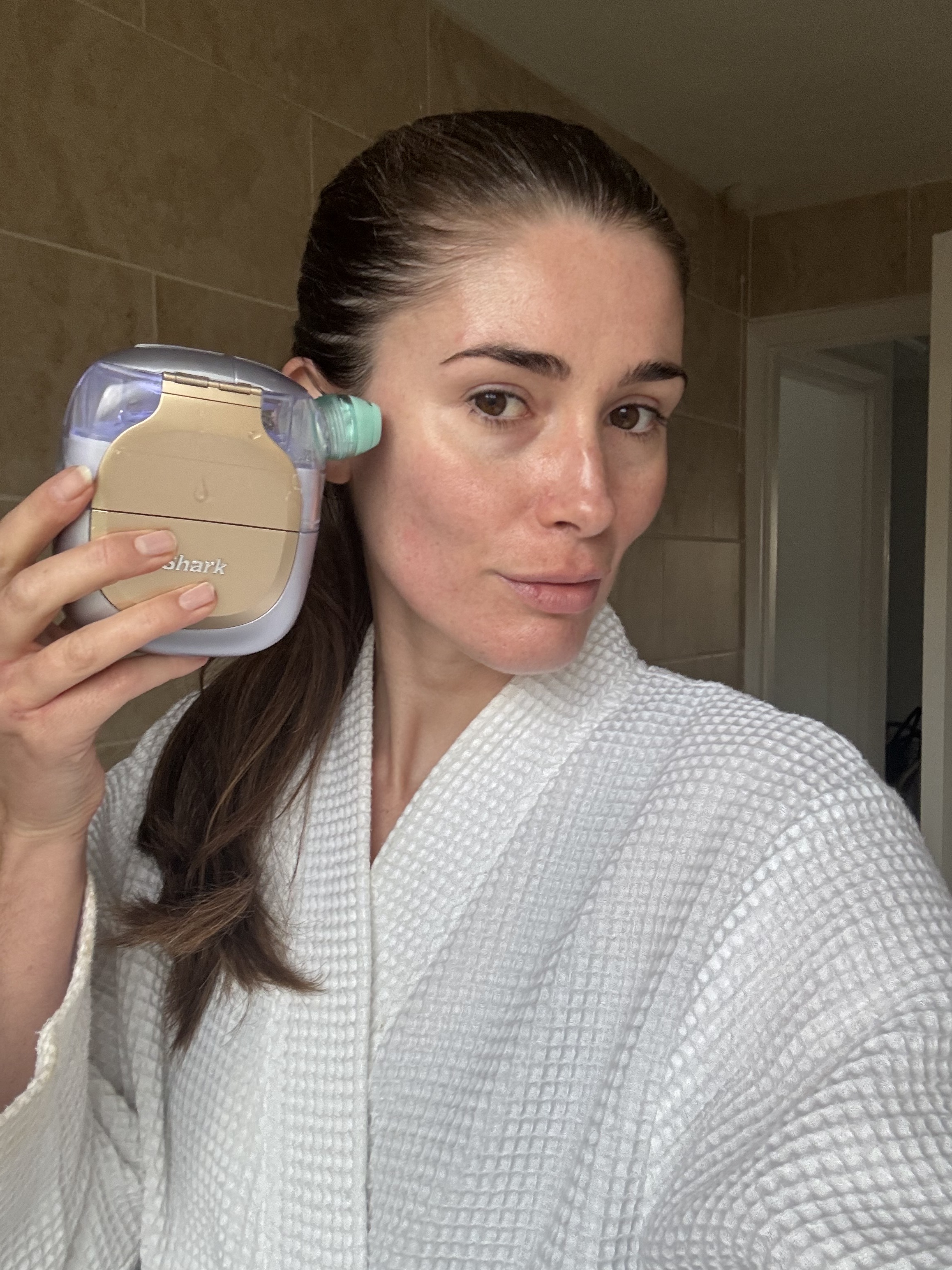 Eleanor testing the Shark FacialPro Glow device
