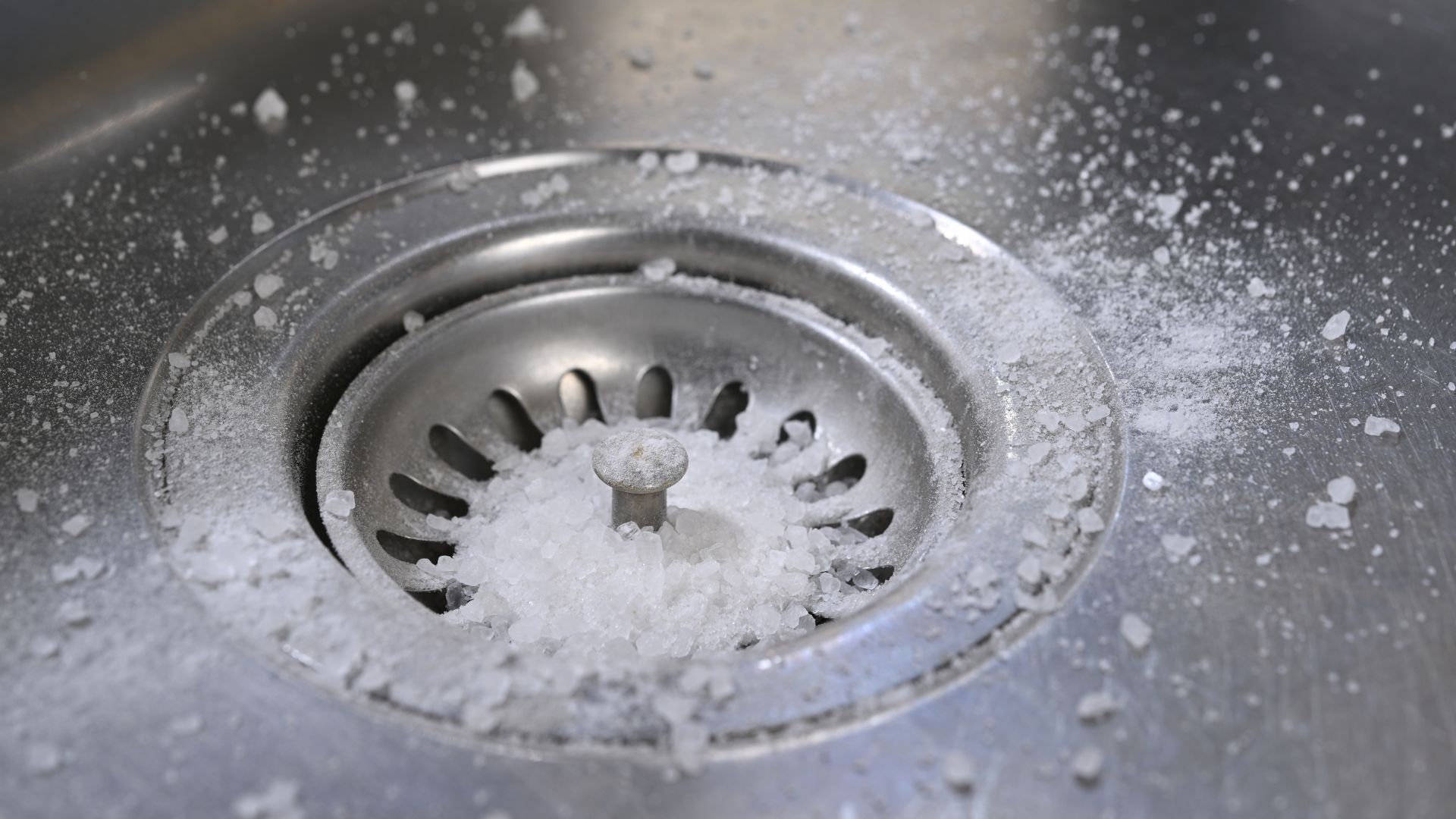 bicarbonate of soda dusted in sink plug hole