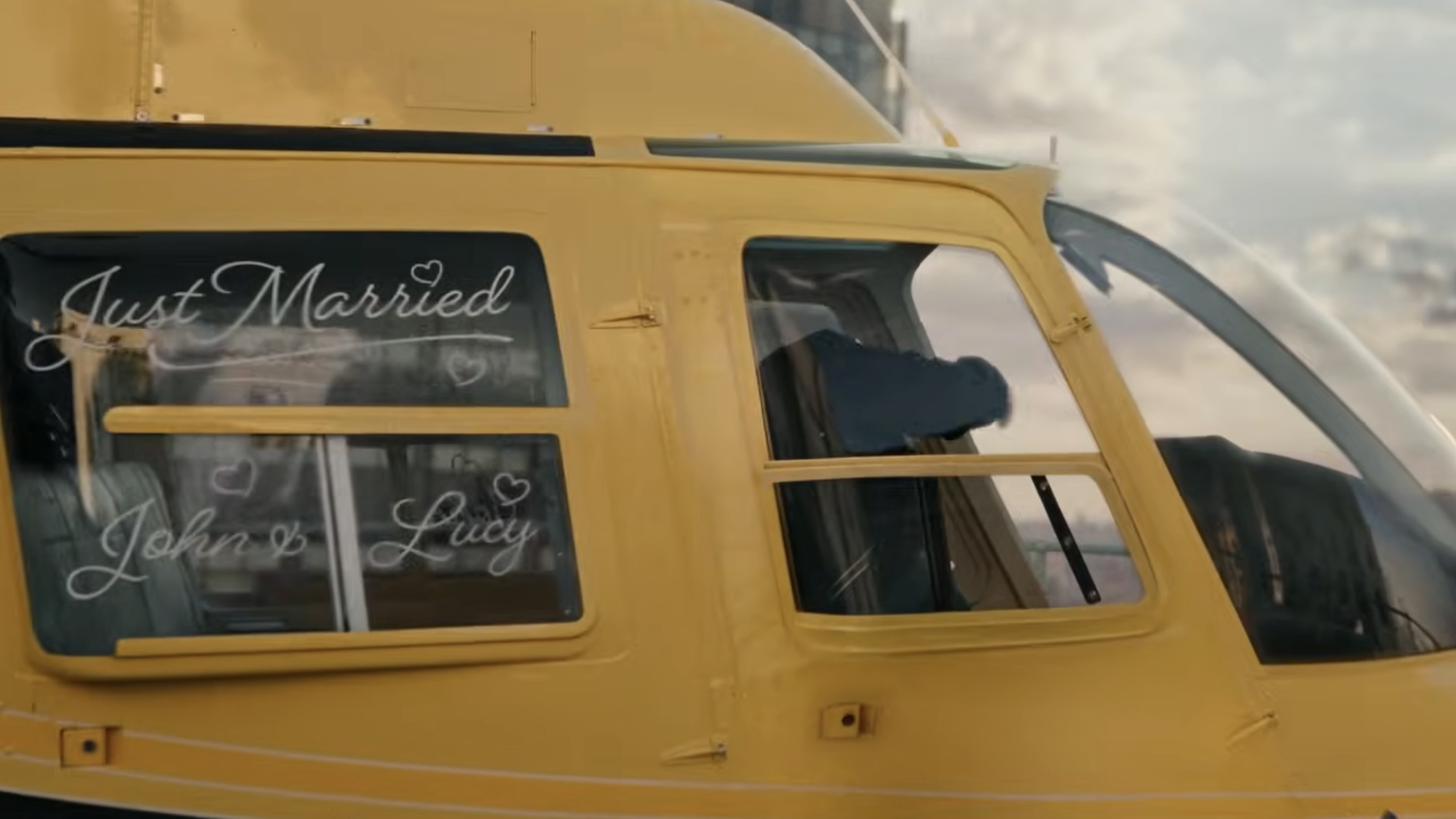 Helicopter with "Just Married John &amp;amp; Lucy" written on window in Spider-Man: Brand New Day