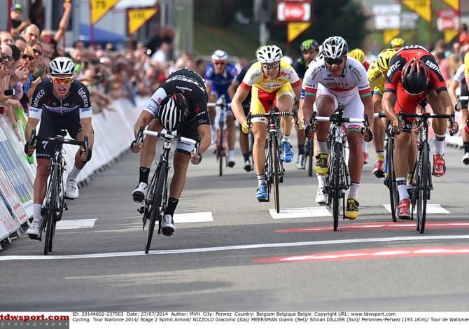 Giacomo Nizzolo (Trek Factory Racing) and Silvan Dillier (BMC) with their heads down sprinting for the win