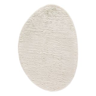 white rug in oval shape
