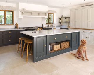 Farmhouse kitchen island in grey with dog in front